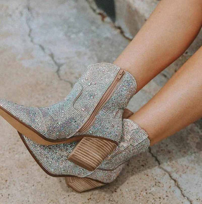 Sparkly cowboy boots with decorative rhinestones and a stylish zip closure for trendy fashion