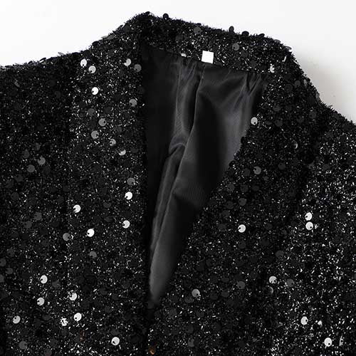 Sparkly party blazer for women featuring shimmering black sequins for a stylish evening look