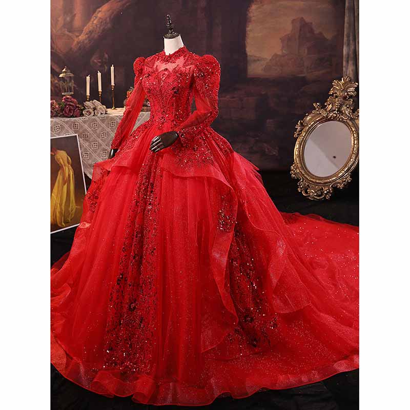 Elegant sparkly red ball gown wedding dress with intricate detailing and flowing train from SD Dresscode & Fashiontrends