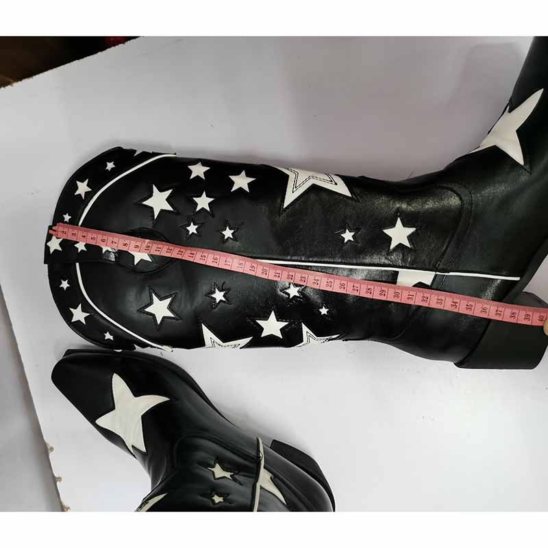 Black star embroidered cowboy boots featuring white star designs for a stylish western look