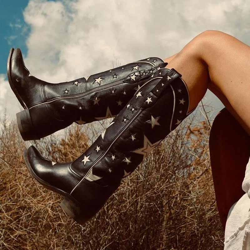 Black star embroidered cowboy boots featuring a unique star design for trendy Western style.
