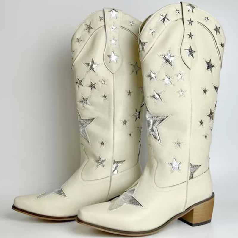 White star embroidered cowboy boots with silver star detailing and classic pointed toe design