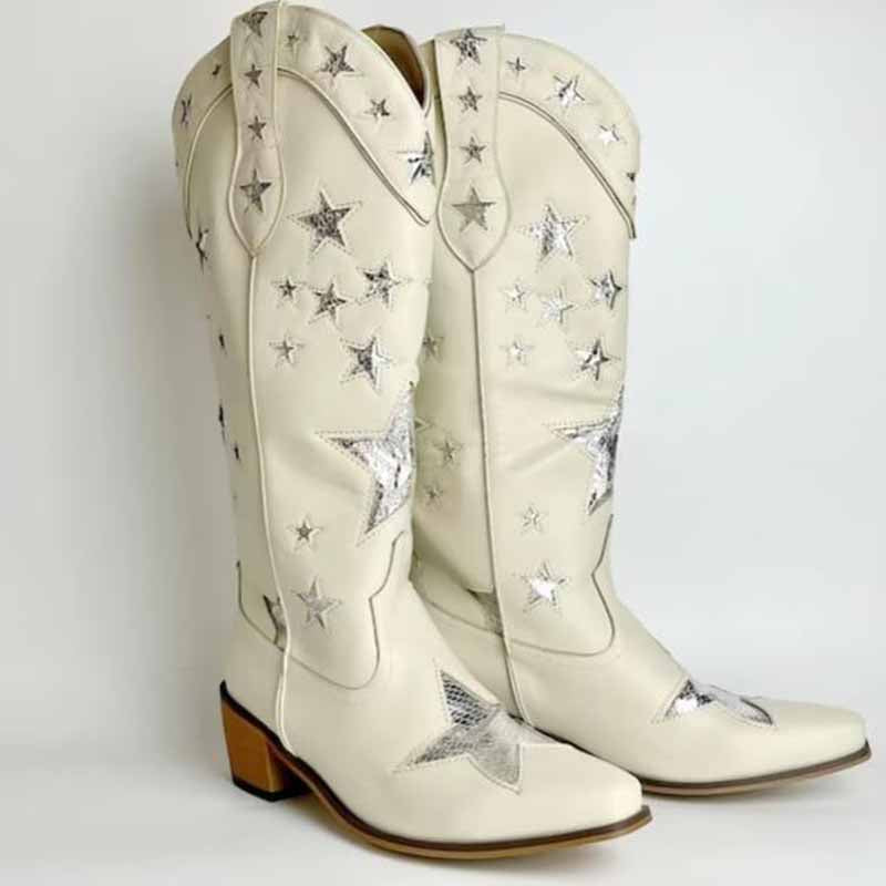White star embroidered cowboy boots featuring silver star designs and a stylish pointed toe