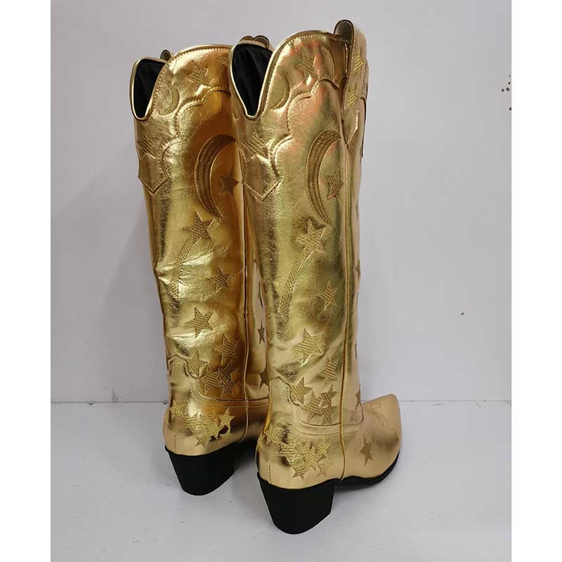 Shiny gold star pattern knee high cowgirl boots with decorative detailing for stylish western wear