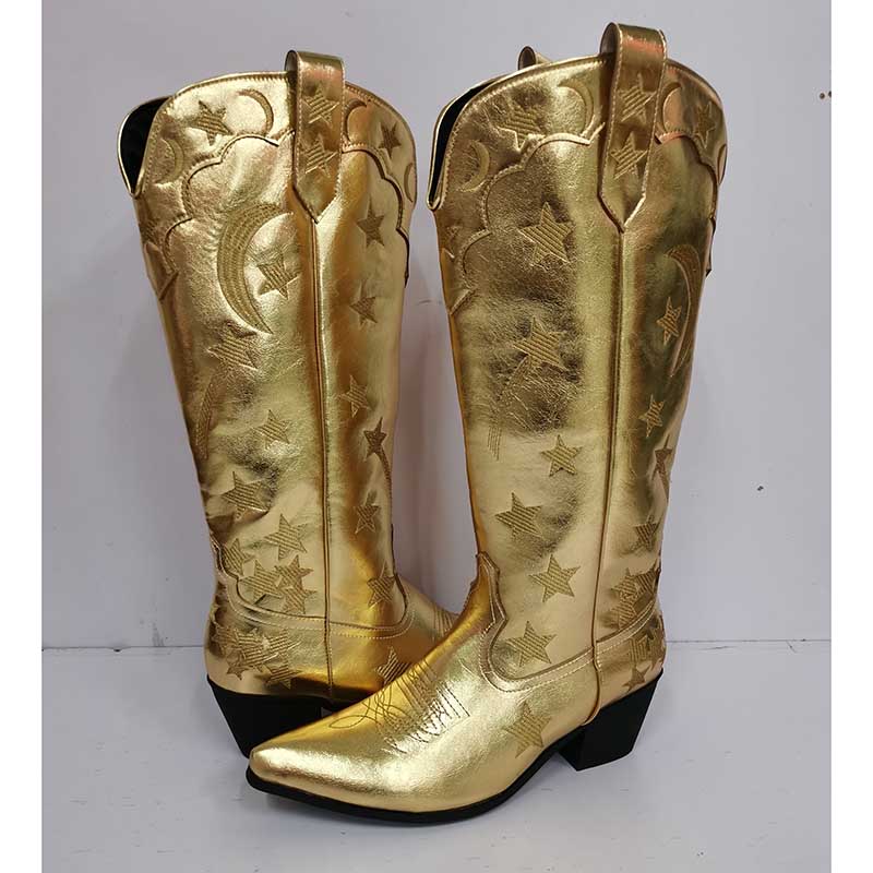 Gold star pattern knee high cowgirl boots with embossed details for a stylish western look