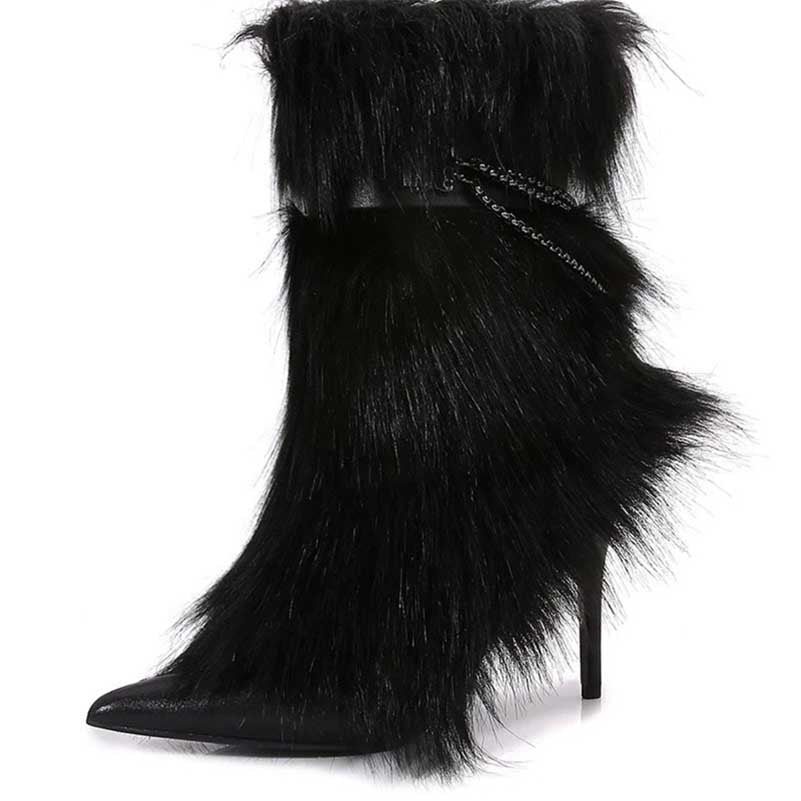 Stylish faux fur boots for evening wear with stiletto heels and a unique design