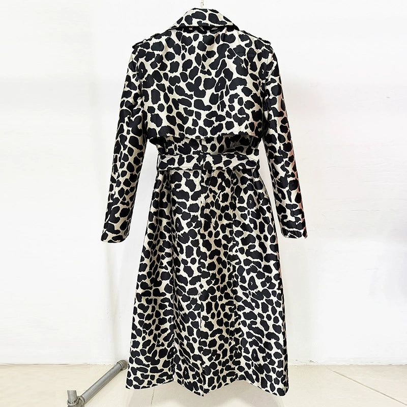 Back view of a tailored animal print long coat featuring a stylish design and belted waist