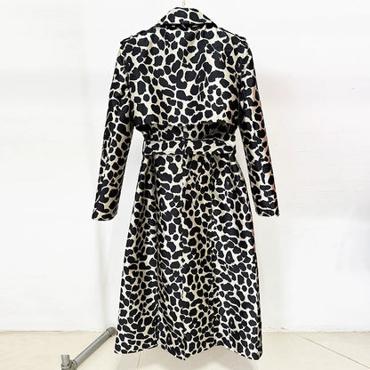 Back view of a tailored animal print long coat featuring a stylish design and belted waist