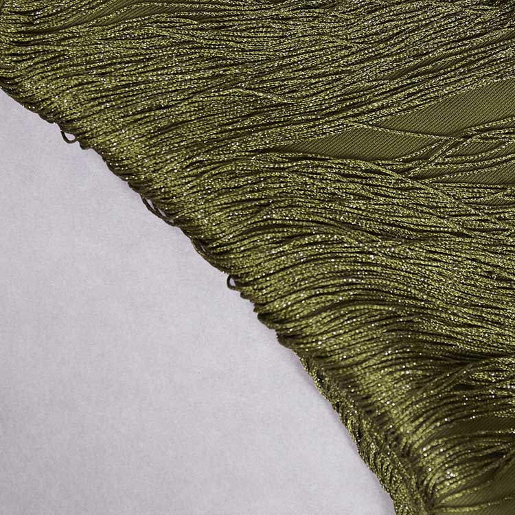 Close-up of olive green tassel turtleneck satin two-piece set fabric with textured detailing