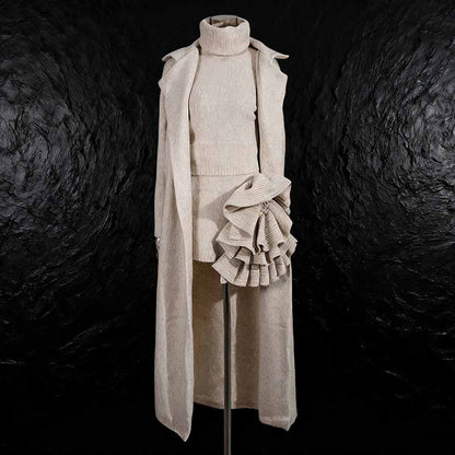 Elegant three piece women's sweater set featuring a turtleneck top, skirt, and long cardigan