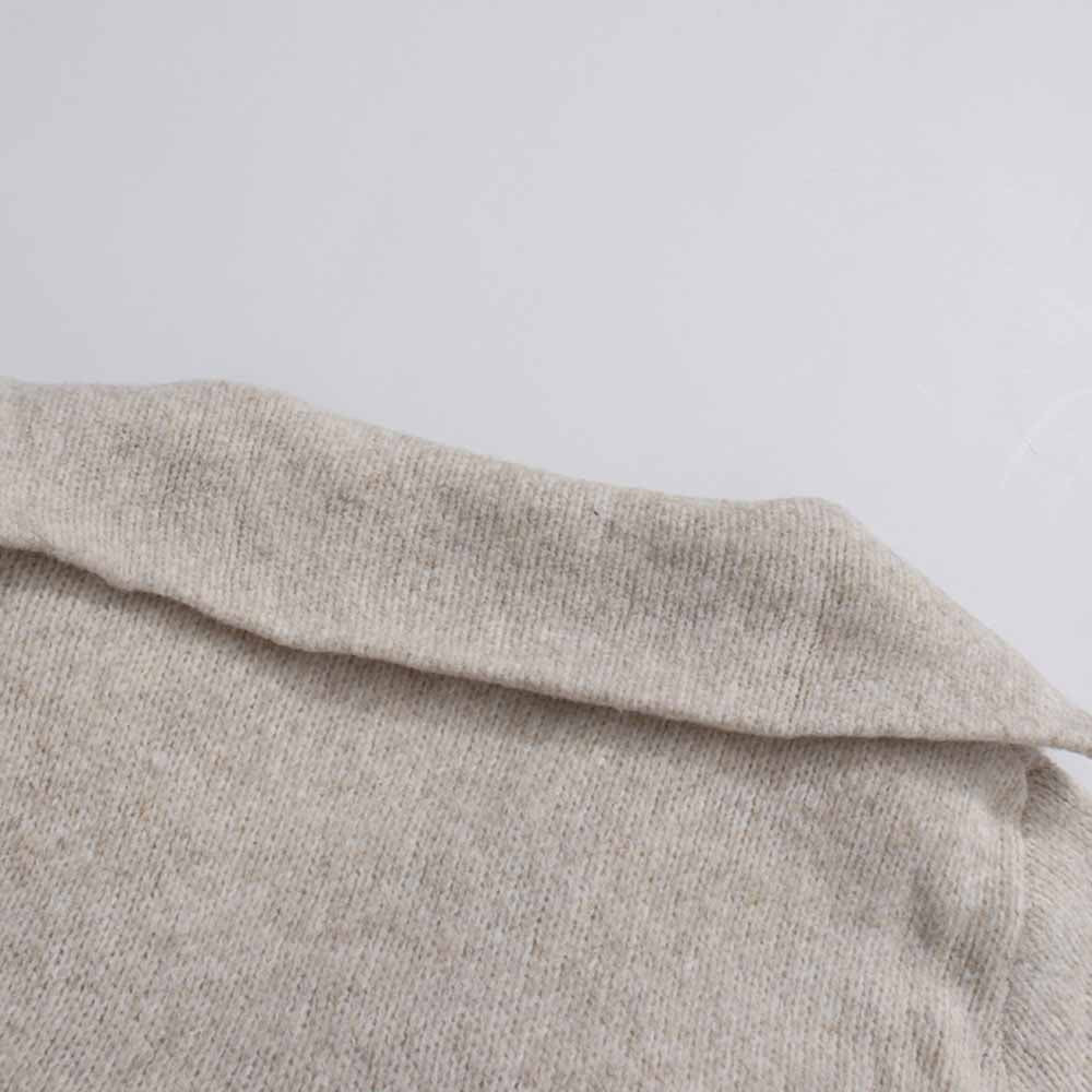 Soft beige three piece women's sweater set with a stylish collar detail