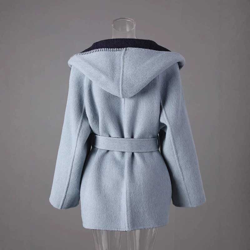 Two-sided winter coat women in light blue with a hood and belted waist for stylish warmth