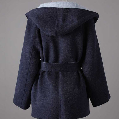 Two-sided winter coat women in navy blue with a hood and belt for stylish warmth