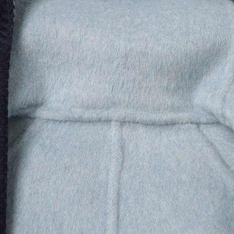 Inside view of a two-sided winter coat women showcasing soft lining and stylish design