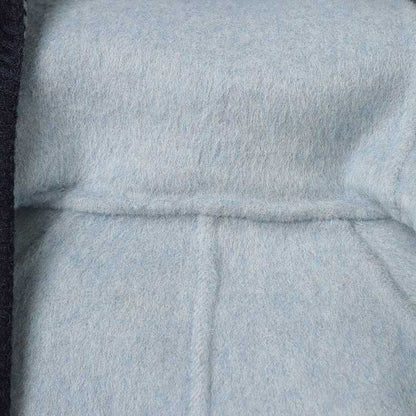 Inside view of a two-sided winter coat women showcasing soft lining and stylish design