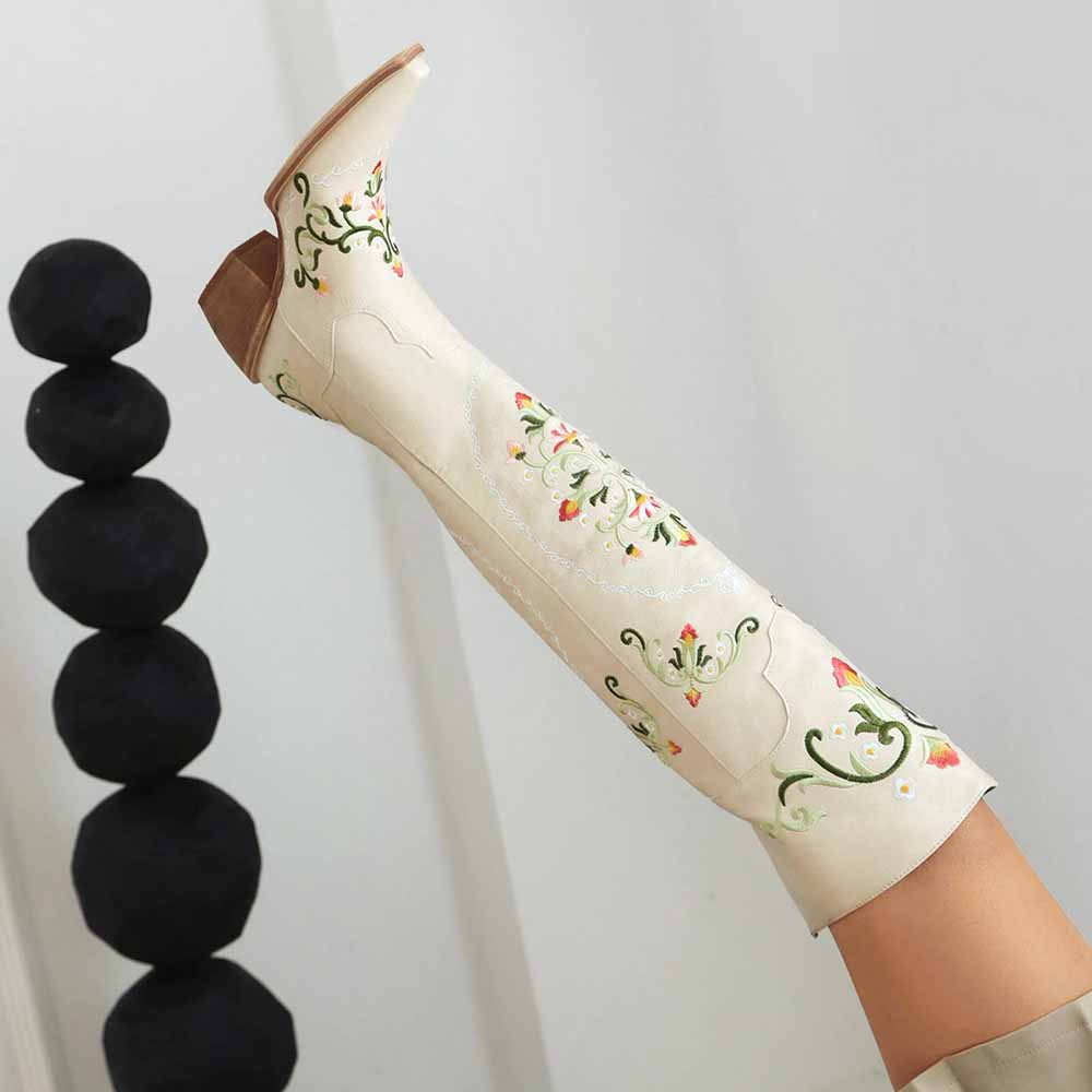 Unique embroidered cowboy boots women featuring floral designs and a stylish high shaft