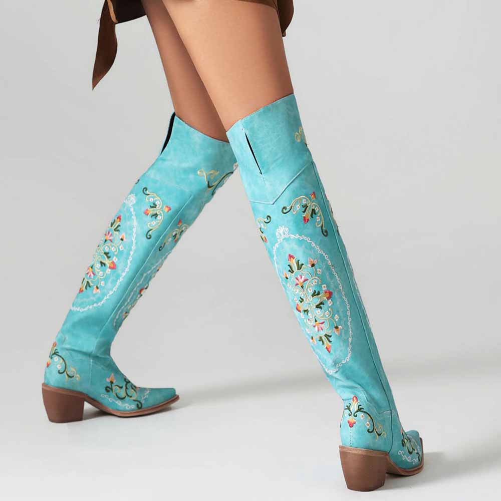 Unique embroidered cowboy boots women in turquoise with intricate floral design and high shaft for stylish wear
