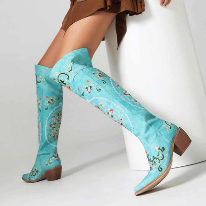 Unique embroidered cowboy boots women in turquoise with intricate floral designs and stylish high shafts