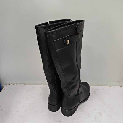 Back view of unisex faux leather riding boots with a sleek design and decorative button detail