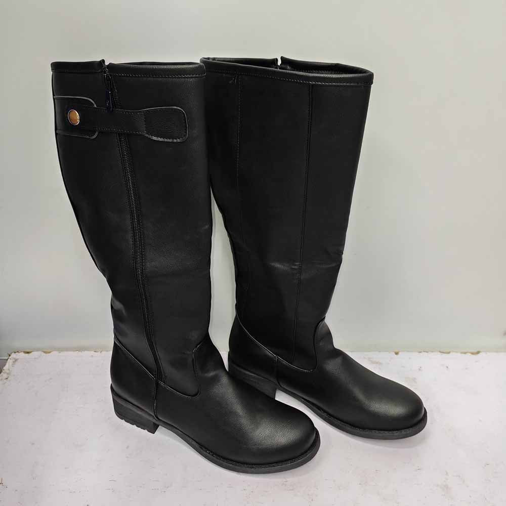 Stylish black unisex faux leather riding boots with a sleek design for versatile wear