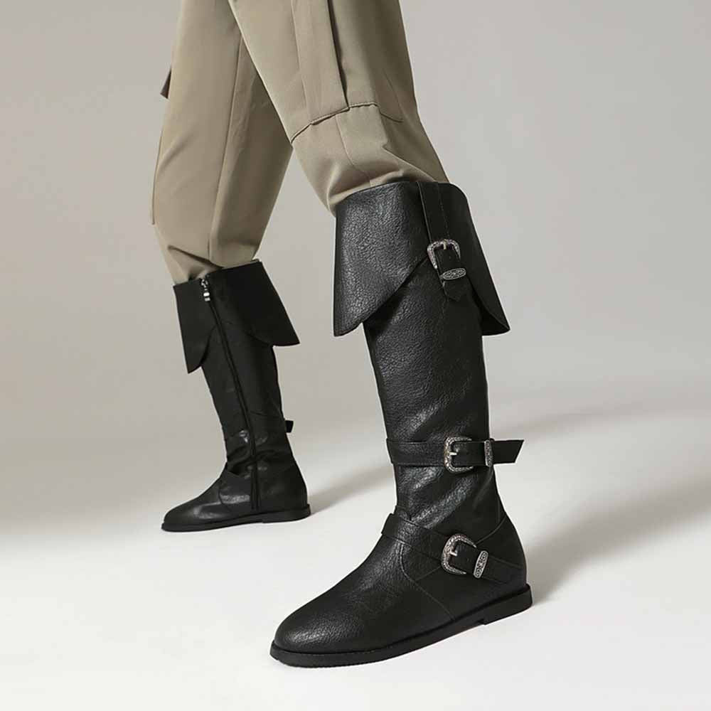 Stylish unisex flat high top boots in black leather with buckle accents and a sleek design