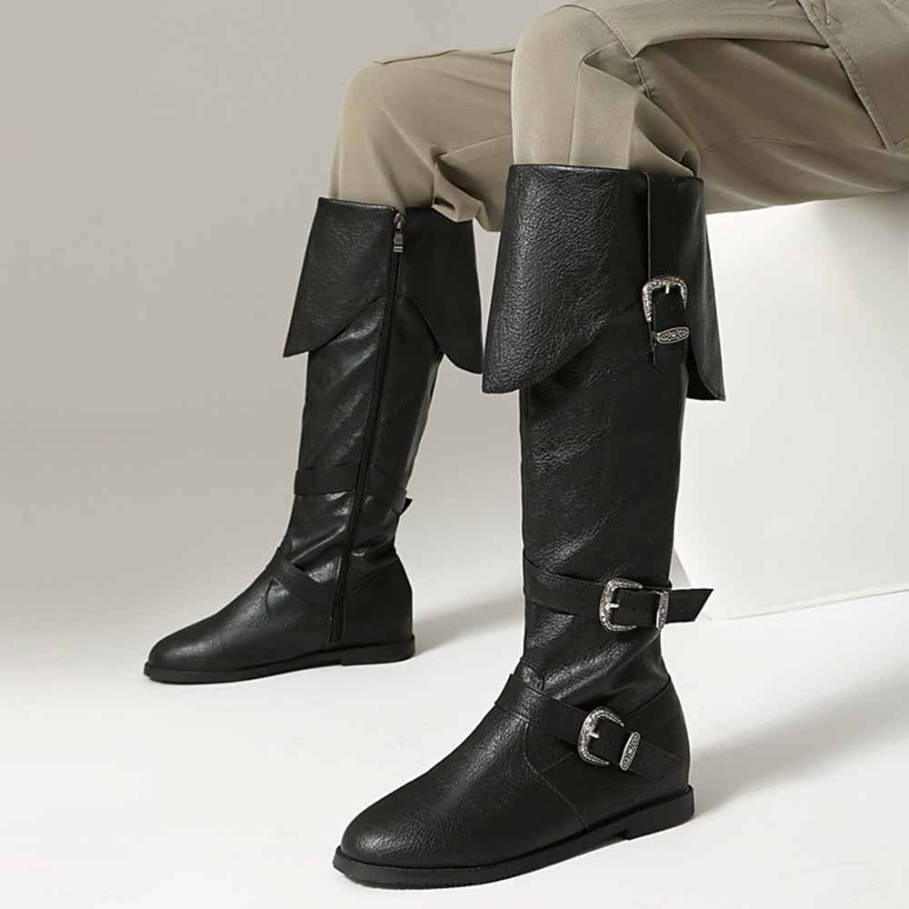 Stylish black unisex flat high top boots with a unique design and adjustable buckles