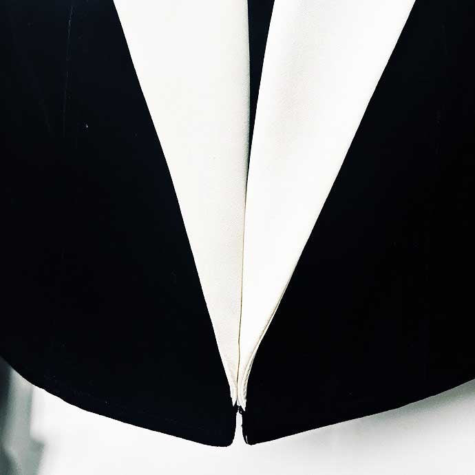 Elegant velvet black blazer with a sleek lapel design for formal occasions