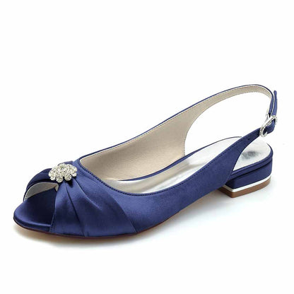Elegant navy blue low heel formal flats for weddings with a decorative jeweled design