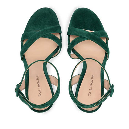 Stylish green women's platform pump sandals with cross-strap design for trendy footwear lovers