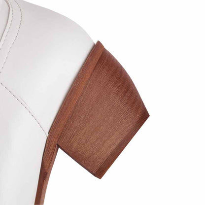 Close-up of vintage floral western booties women showcasing a stylish wooden heel design