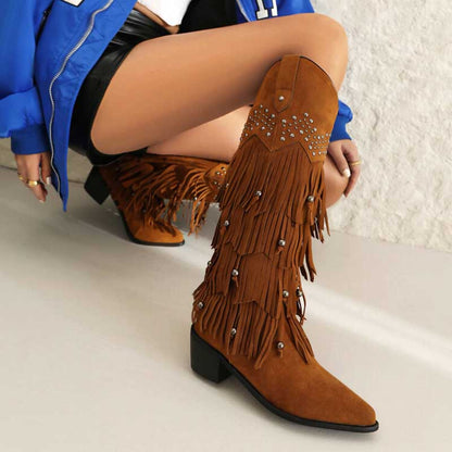 Stylish vintage tassel cowgirl boots with fringe details and a trendy block heel
