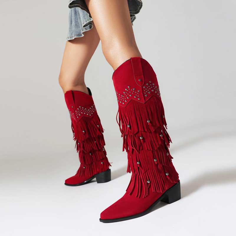 Red vintage tassel cowgirl boots with fringe and studded detailing for stylish western wear