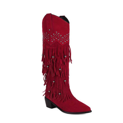 Red vintage tassel cowgirl boots with fringe and studded details for a stylish country look