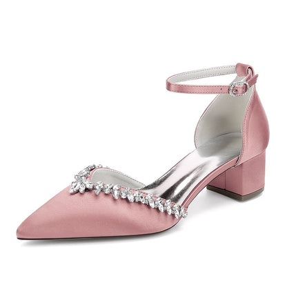 Pink wedding ankle strap heels for bride with decorative detailing and comfortable block heel