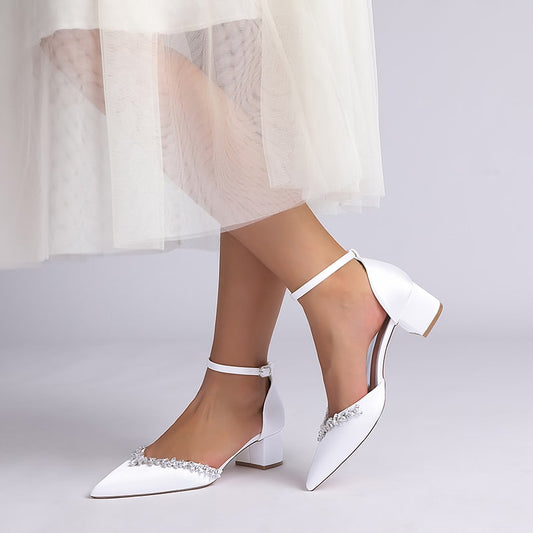 Elegant white wedding ankle strap heels for bride with embellished design and low block heel