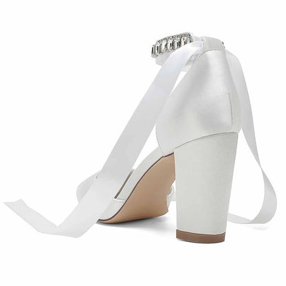 Elegant white wedding chunky heel shoes for women with satin finish and decorative ribbon details