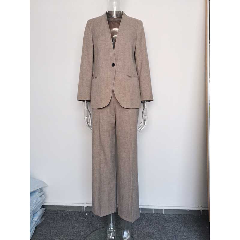 Formal women's vest pantsuit wedding in beige with tailored jacket and wide-leg trousers