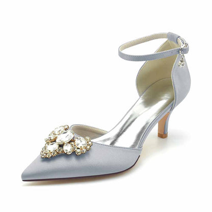 Elegant light blue heels for a wedding with sparkling jeweled embellishments and ankle strap