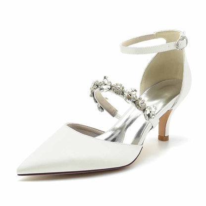 Elegant white wedding heels shoes with embellished straps and a classic pointed toe design