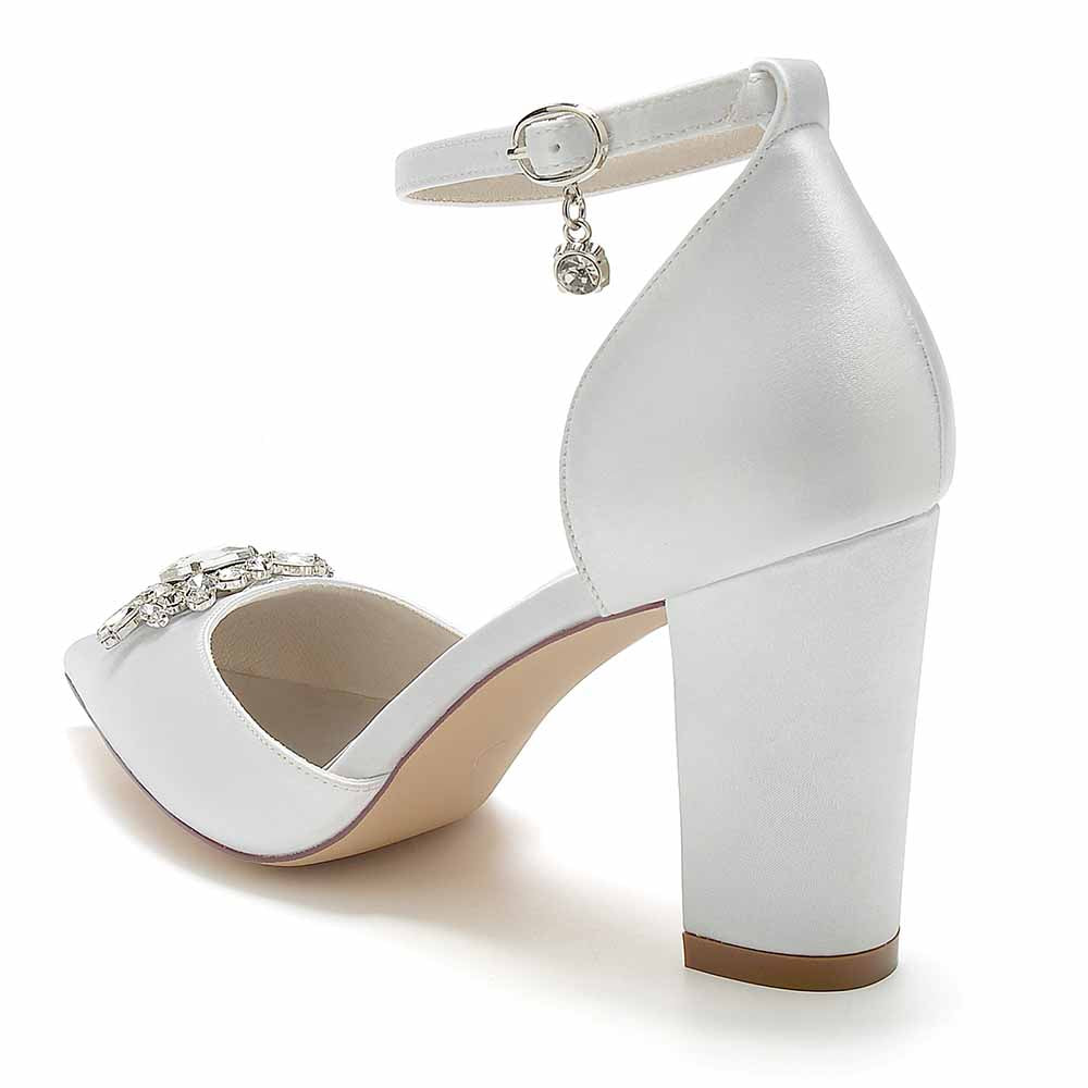 Elegant point toe satin wedding shoes by S&DCo with a block heel and decorative embellishment