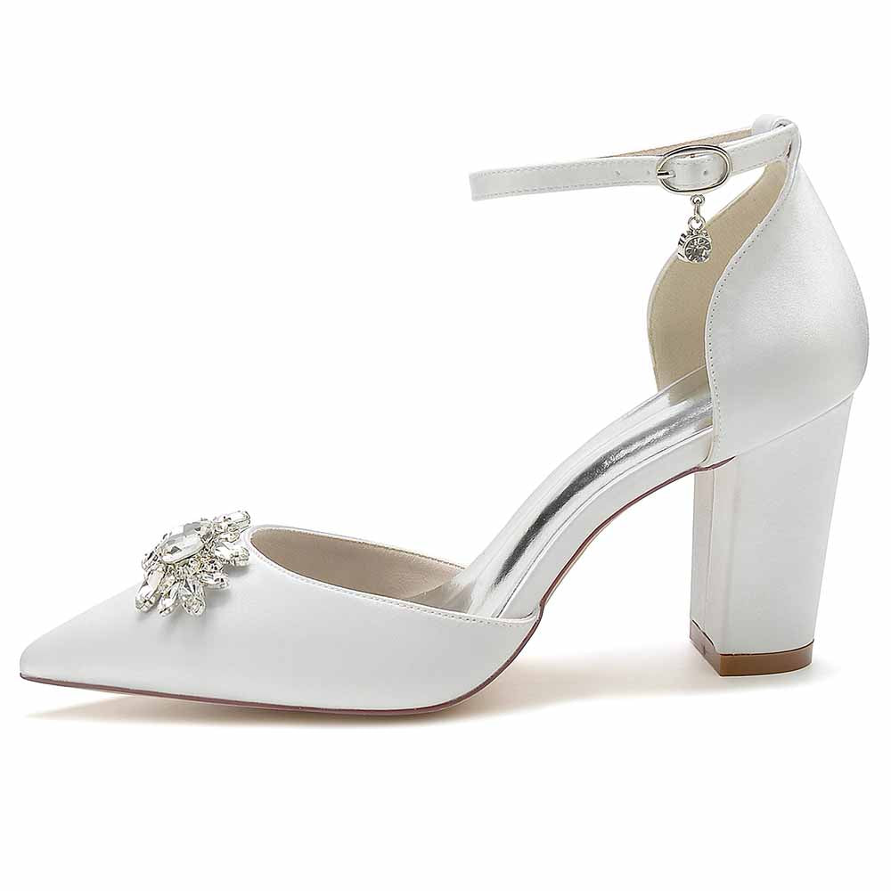Elegant point toe satin wedding shoes with a decorative jewel and ankle strap for bridal occasions