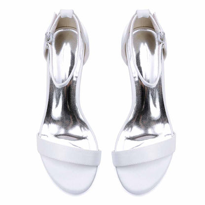 Elegant chunky heel wedding sandals in white with glossy finish and adjustable ankle strap