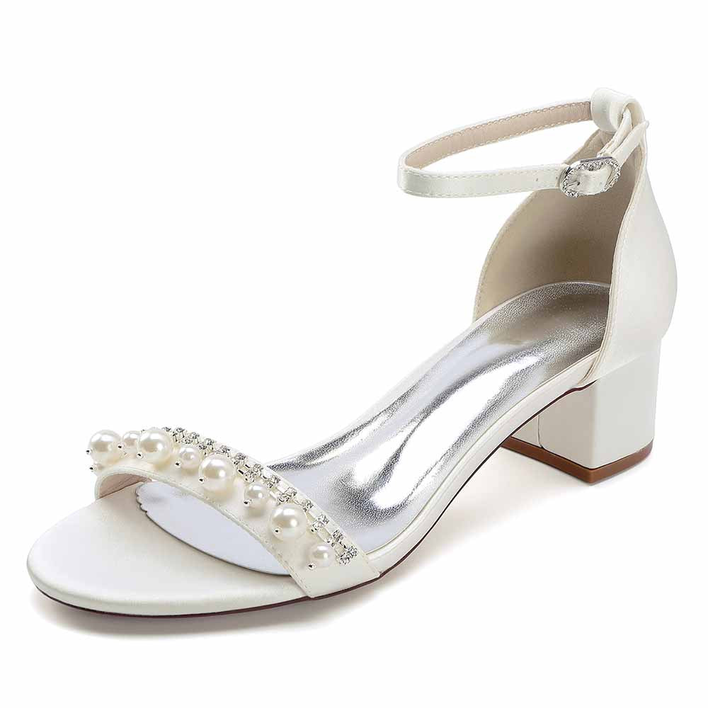 Elegant block heel wedding sandals for women featuring pearl embellishments and ankle strap