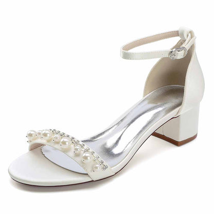 Elegant block heel wedding sandals for women featuring pearl embellishments and ankle strap