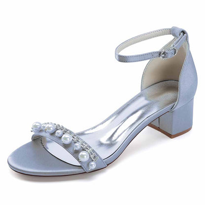 Elegant block heel wedding sandals for women in silver with pearl embellishments for a stylish look