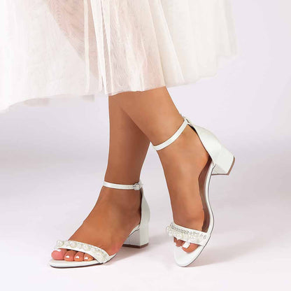 Elegant white block heel wedding sandals for women with pearl embellishments and ankle strap