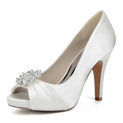 Elegant satin peep toe wedding shoes by S&DCo. featuring a decorative gem on the front