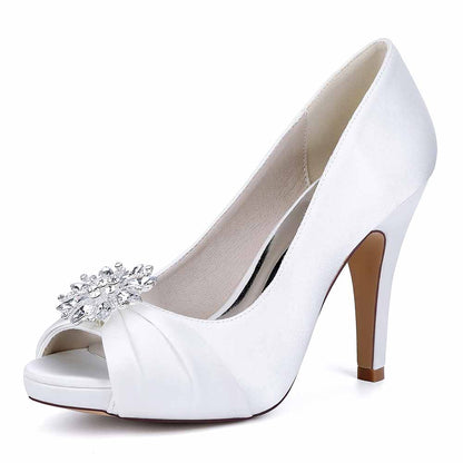 Elegant satin peep toe wedding shoes by S&DCo with a decorative rhinestone embellishment