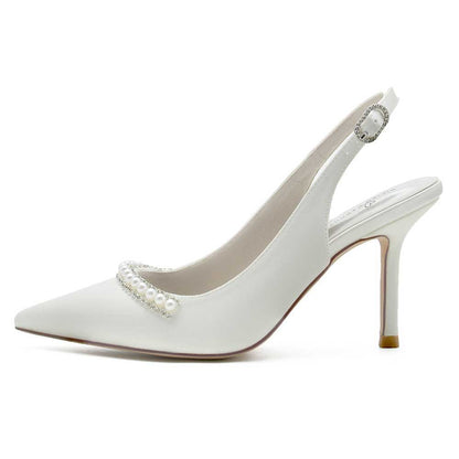 Elegant wedding satin slingback shoes with a pointed toe and pearl detailing for bridal occasions