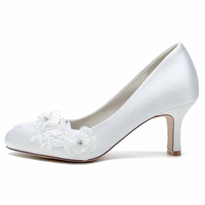 Elegant S&DCo. wedding shoes for bride low heel with floral lace detail in white